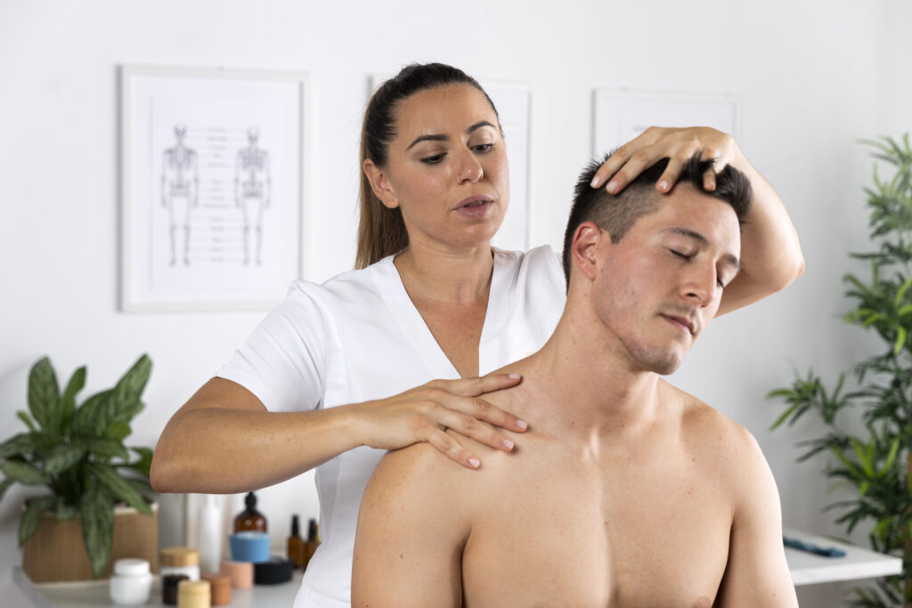 A man receiving a massage at a NeuroRehab Clinic in Calgary.